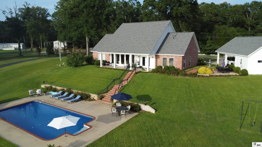 Nestled on a hilltop, this stunning lake home offers expansive - photo 36