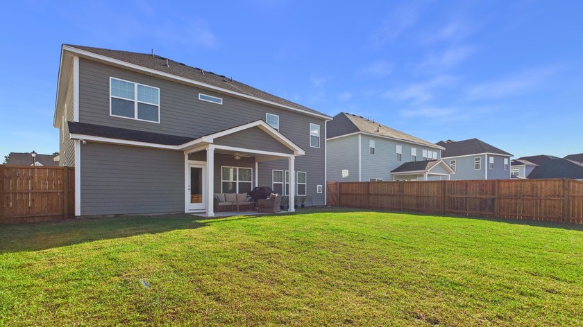 Showing like a designer model, this home has a feeling of - photo 49