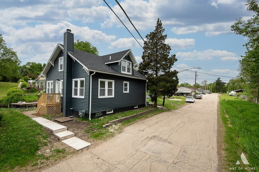 This stunning channel-front home offers the perfect combination - photo 4