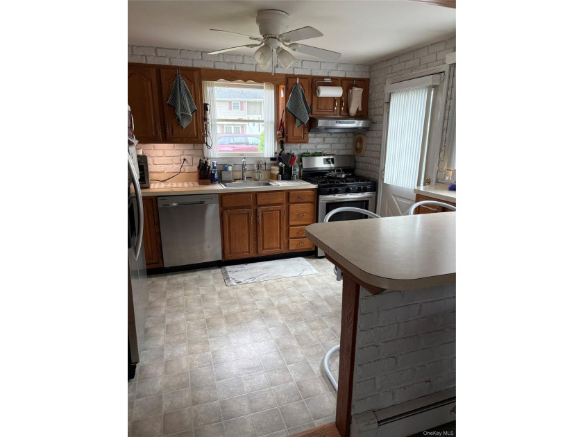 Opportunity awaits in the highly desirable Shoreham-Wading River - photo 9