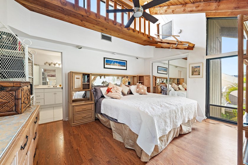 Just a 5-minute walk to Jupiter Beach, this 2-bedroom, 2 bath - photo 11