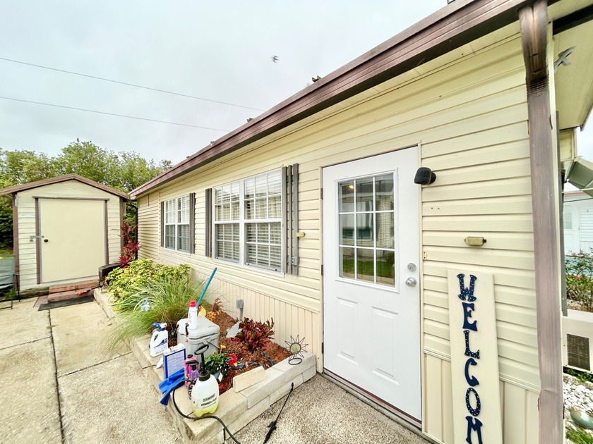 This mobile home is located in a peaceful 55+ community and - photo 14
