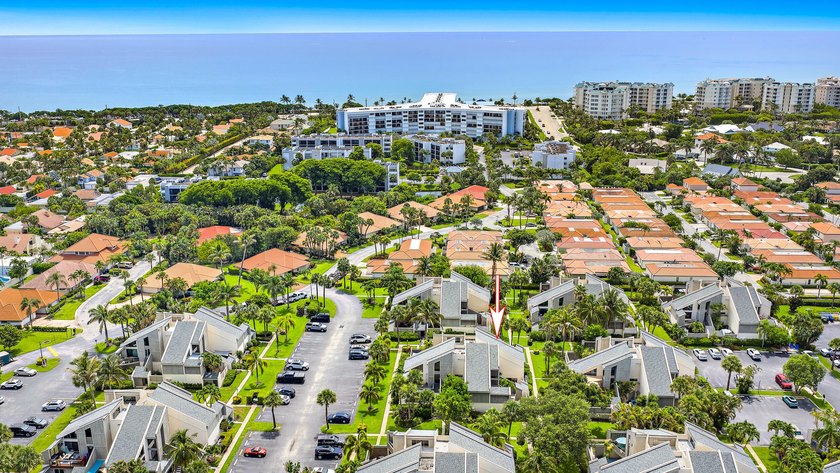 Just a 5-minute walk to Jupiter Beach, this 2-bedroom, 2 bath - photo 21