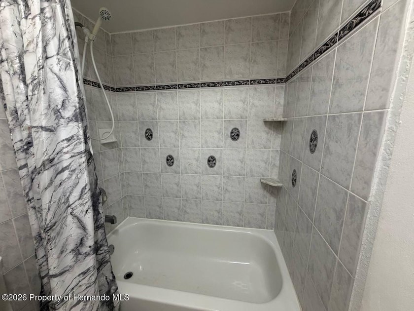 Welcome to this spacious 3-bedroom, 2-bath home featuring a - photo 27