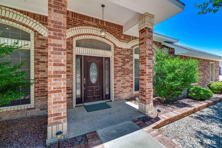 This beautiful home offers spacious living with soaring ceilings - photo 8