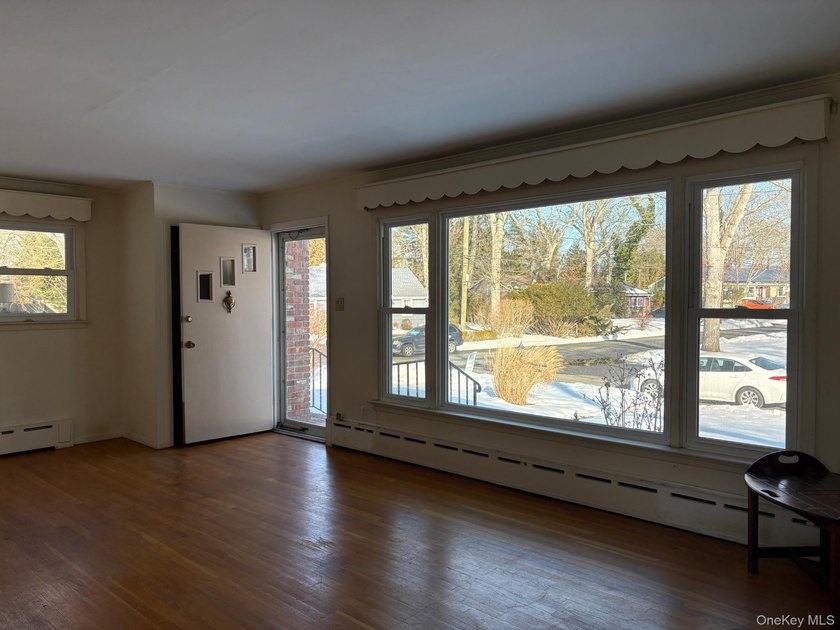 Charming ranch-style home featuring 3 bedrooms, 2 bathrooms, and - photo 3