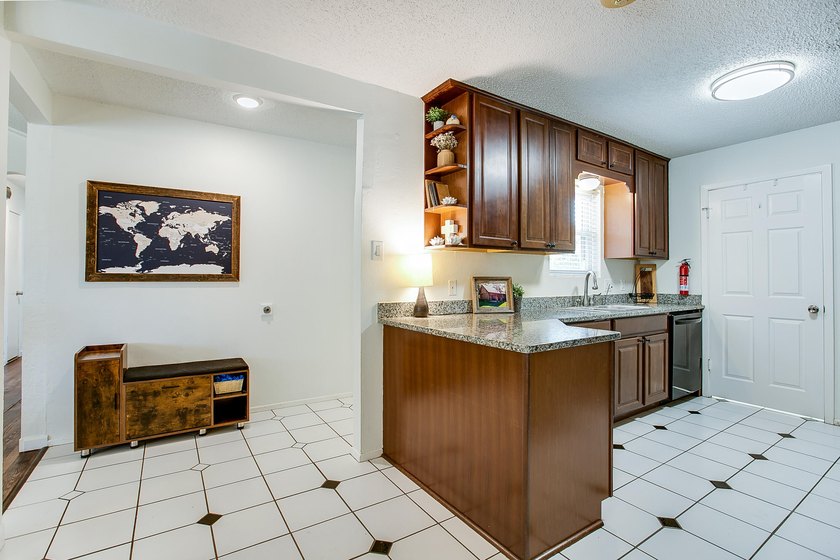 Welcome home to this beautifully updated 4-bedroom, 2-bathroom - photo 8
