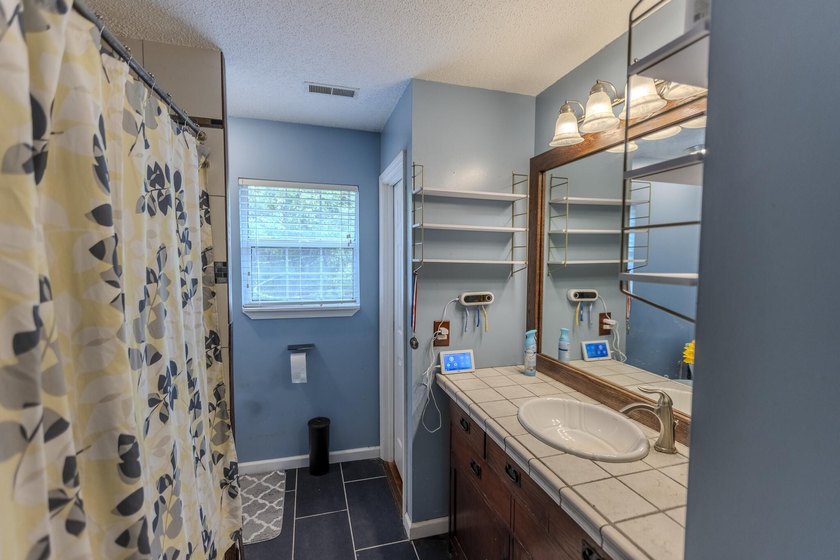 Welcome to peaceful country living in Pineville, where you can - photo 12