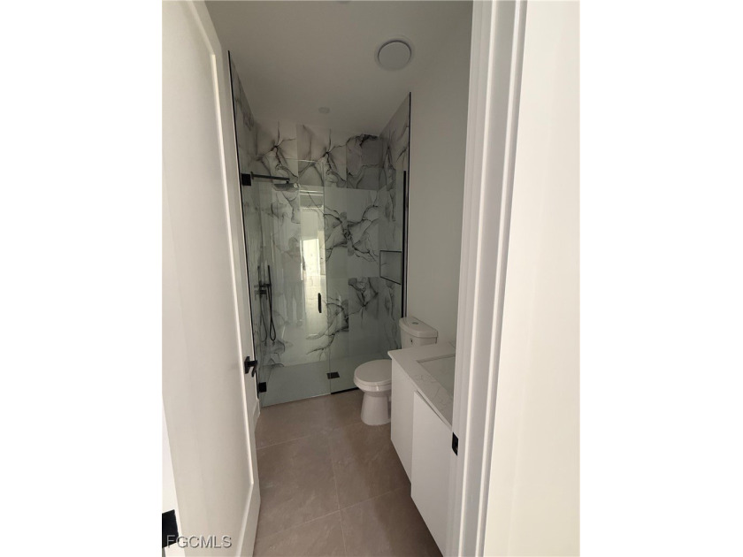 STEP INTO MODERN LUXURY in this stunning BRAND-NEW CONSTRUCTION - photo 3
