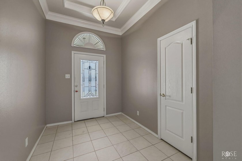 This beautiful, 4-bedroom brick home offers numerous updates and - photo 3