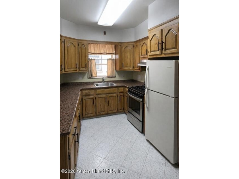 Welcome to 1855 65th Street, a well-maintained and versatile - photo 6