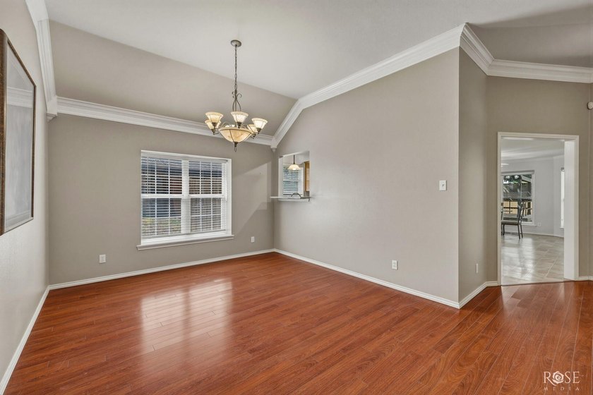 This beautiful, 4-bedroom brick home offers numerous updates and - photo 7