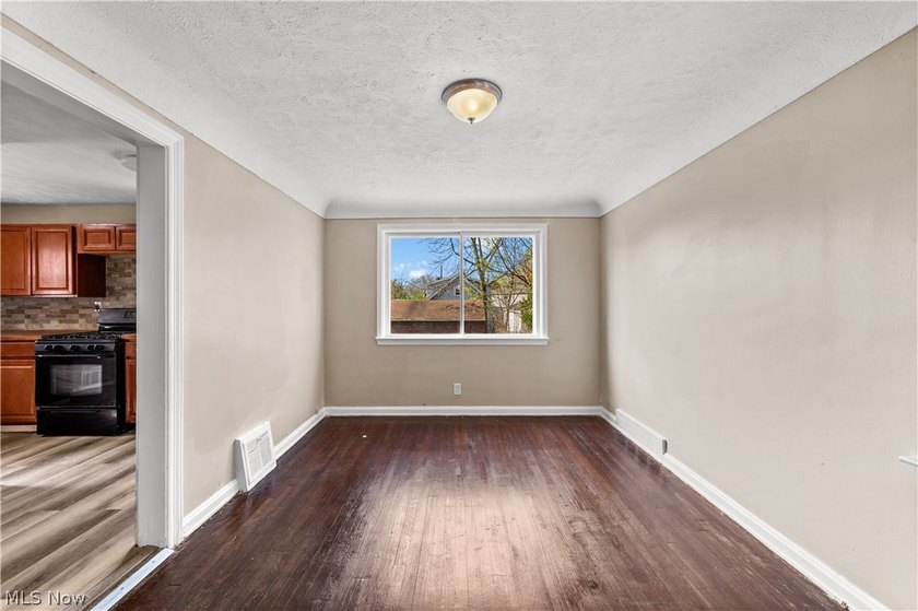 Welcome to 17904 Neff Rd in Euclid, a charming home located on a - photo 6