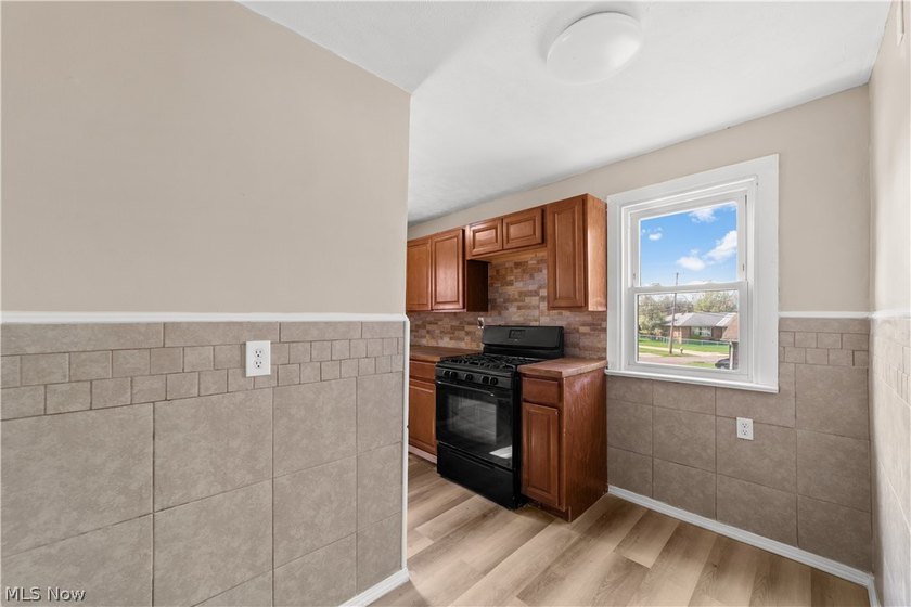 Welcome to 17904 Neff Rd in Euclid, a charming home located on a - photo 9