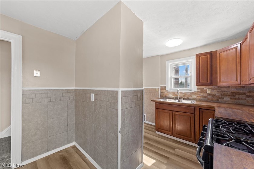 Welcome to 17904 Neff Rd in Euclid, a charming home located on a - photo 10