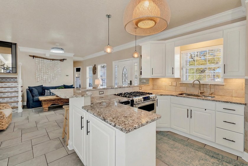 Welcome to your dream beach retreat located within the gates of - photo 3