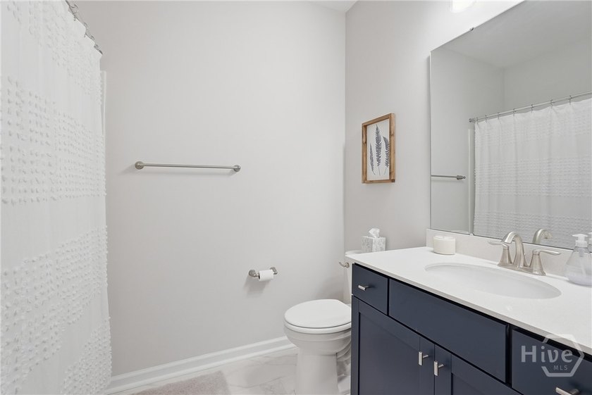 End unit townhome with custom closets and extended paver patio - photo 14