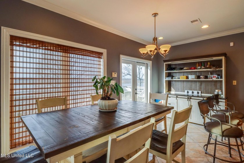 Introducing a rare riverfront retreat in the sought-after - photo 11