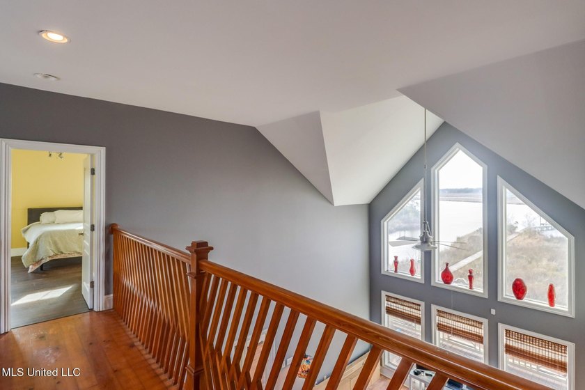 Introducing a rare riverfront retreat in the sought-after - photo 20
