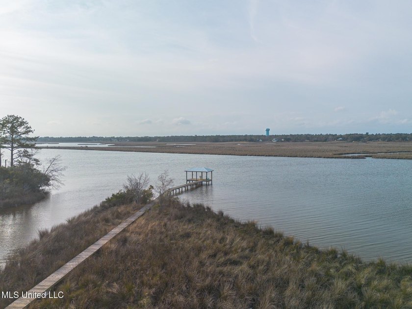 Introducing a rare riverfront retreat in the sought-after - photo 35