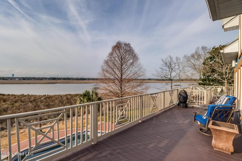 Introducing a rare riverfront retreat in the sought-after - photo 40