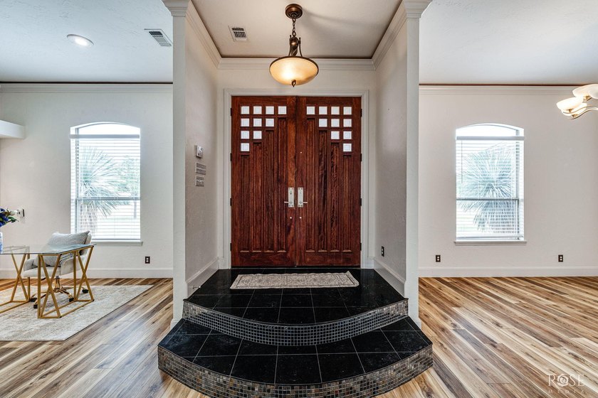 Welcome to an extraordinary Butler Farms residence where - photo 5