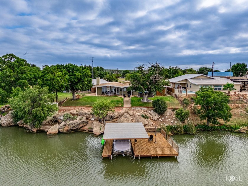 Experience the best of Lake living in this beautifully updated - photo 2