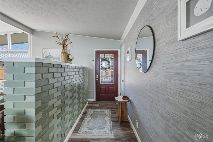Experience the best of Lake living in this beautifully updated - photo 8