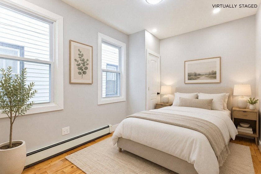 JUST LISTED MOVE-IN READY SUNNY SOUTH-FACING 2-FAMILY TOWNHOUSE - photo 4
