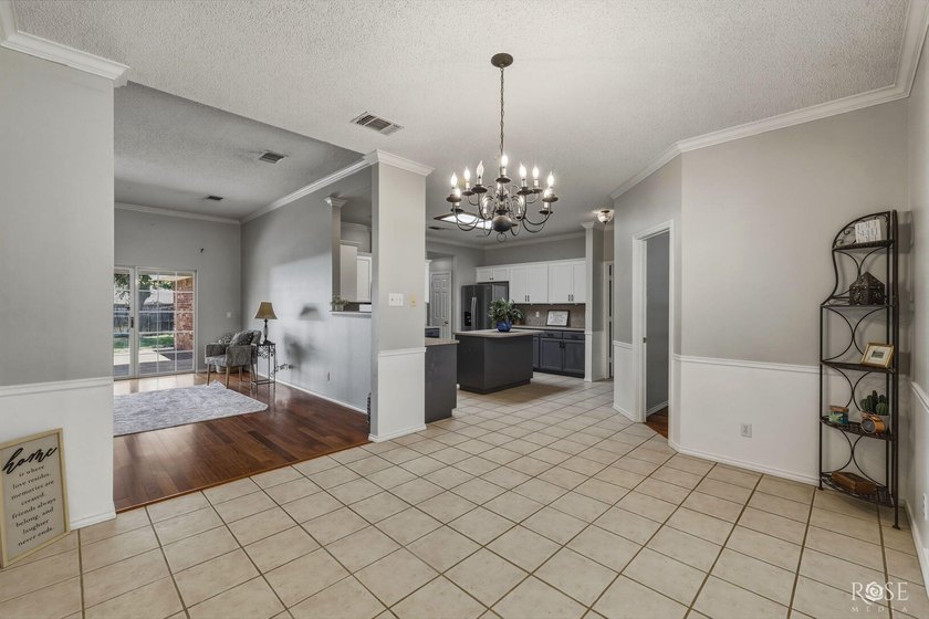 Welcome home to this well-priced 3 bedroom, 2 bath gem in - photo 8