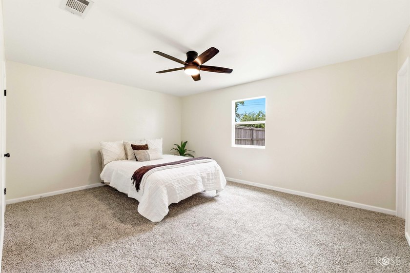 Welcome home to this beautifully updated 4-bedroom, 2-bath - photo 9