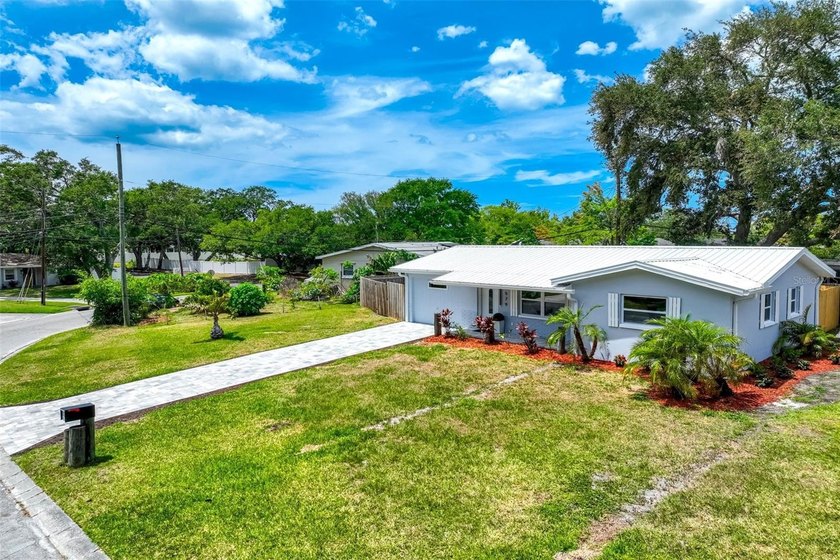 This beautifully updated 3-bedroom Largo home stands out from - photo 2