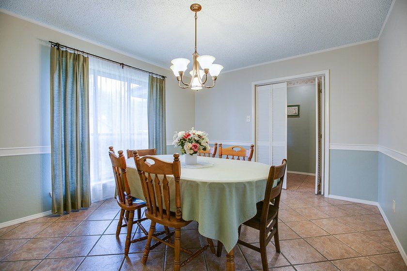WOW!!! Spacious 4BR/2BA home located on a beautiful tree lined - photo 7