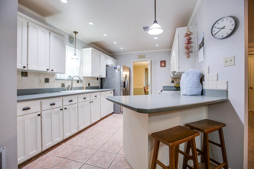WOW!!! Spacious 4BR/2BA home located on a beautiful tree lined - photo 9