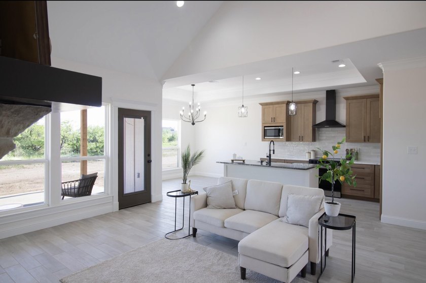 Stunning New Construction by Deluxe Custom Homes! This gorgeous - photo 2
