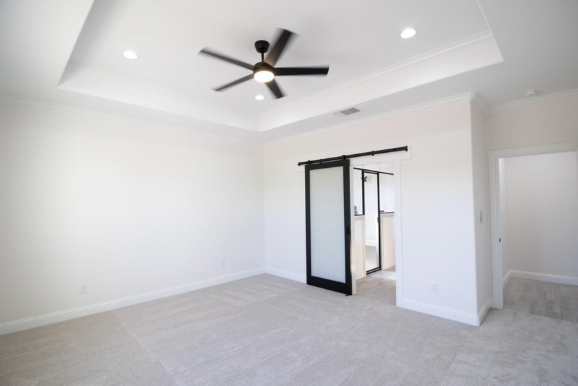 Stunning New Construction by Deluxe Custom Homes! This gorgeous - photo 6