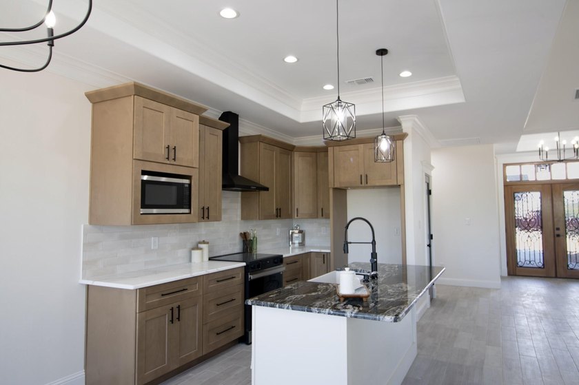 Stunning New Construction by Deluxe Custom Homes! This gorgeous - photo 9