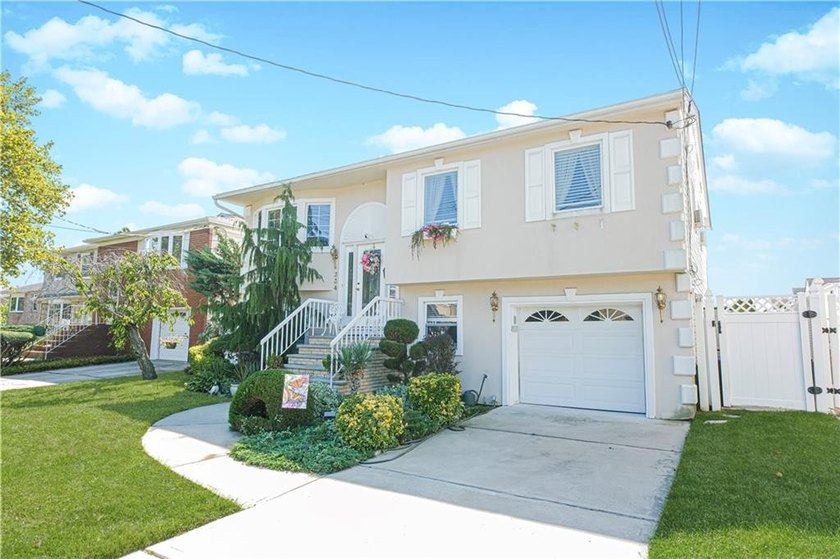 This beautiful detached single-family home is situated on a - photo 3