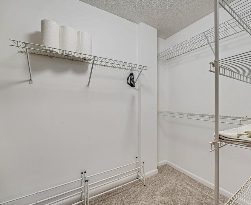 This turnkey 55+ community condo is move-in ready, featuring a - photo 12