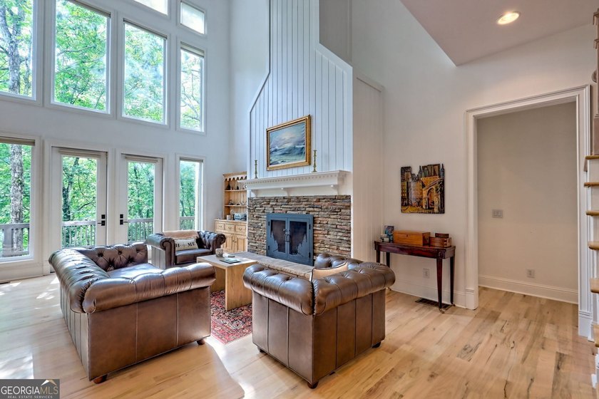Nestled in the coveted Waterfall at Lake Burton community, this - photo 8