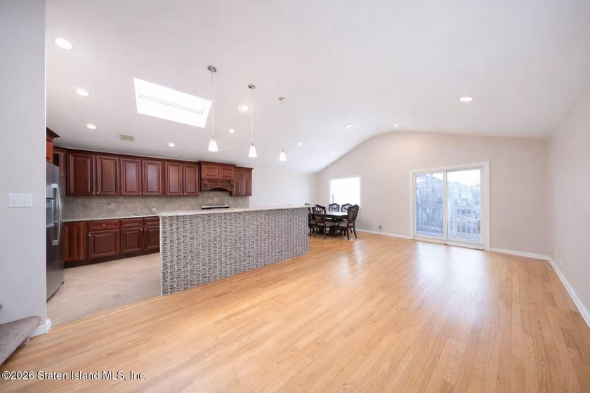 Stunning Two Family Semi-Attached home conveniently located to - photo 6
