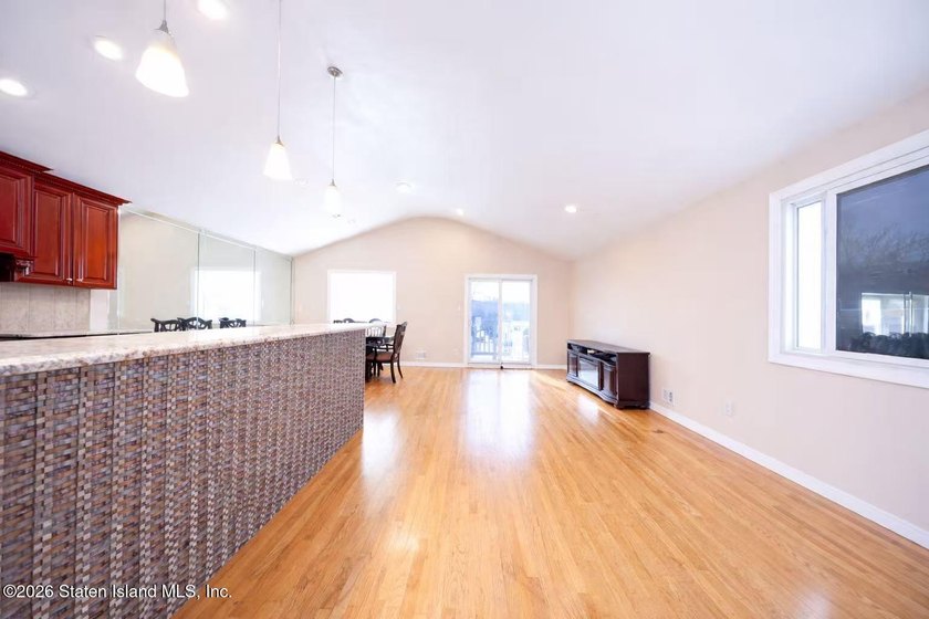 Stunning Two Family Semi-Attached home conveniently located to - photo 7