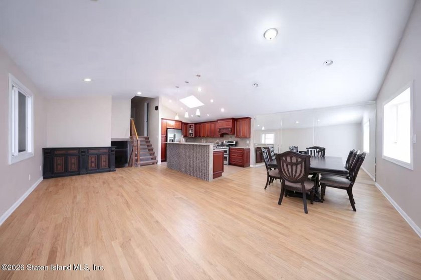 Stunning Two Family Semi-Attached home conveniently located to - photo 10