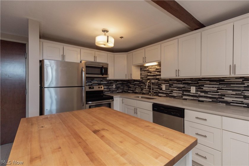 Spacious three-level, one-bedroom condo located in the desirable - photo 5