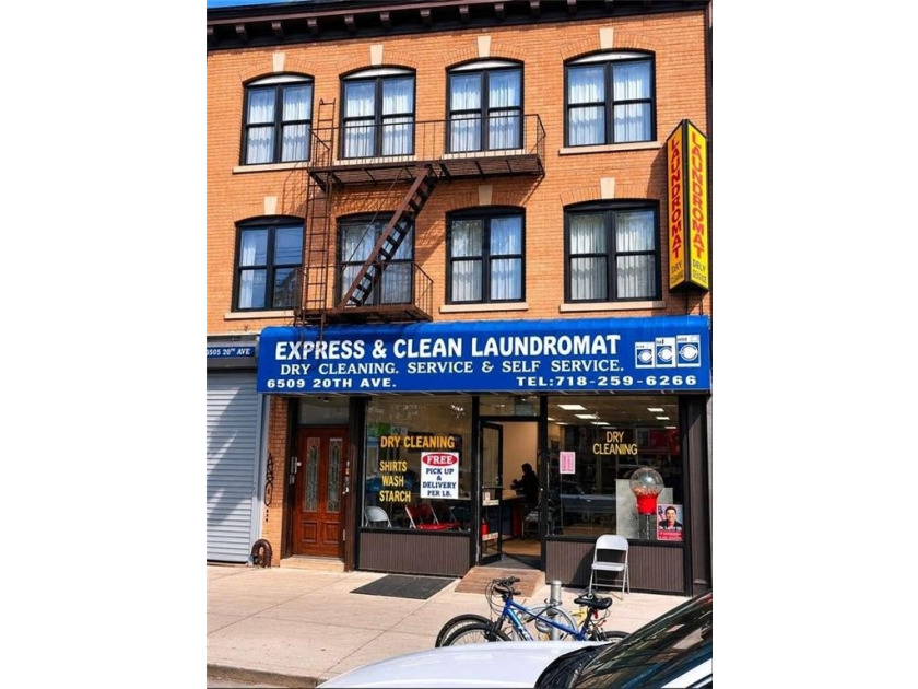 Beautifully renovated brick mixed-use property located in the - photo 2