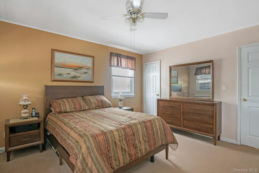 This well-maintained brick home offers a spacious and functional - photo 11