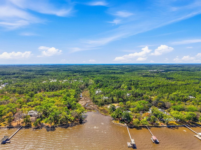 This beautiful waterfront homesite is tucked away in the - photo 12