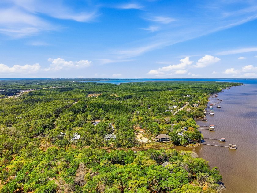 This beautiful waterfront homesite is tucked away in the - photo 13