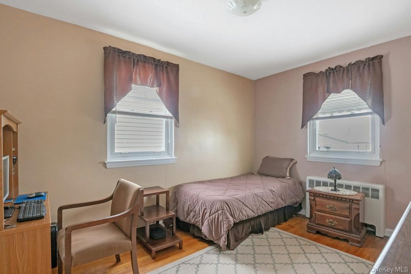 This well-maintained brick home offers a spacious and functional - photo 13