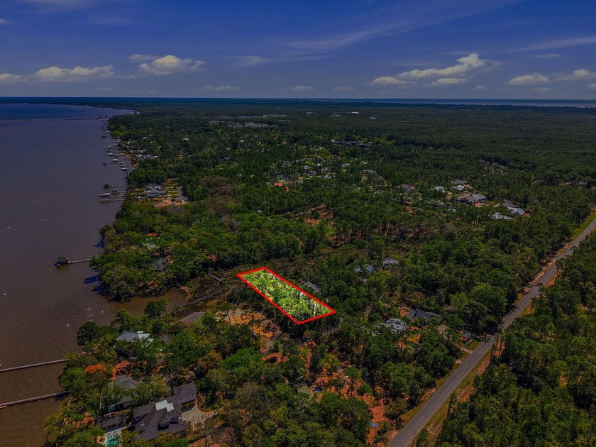 This beautiful waterfront homesite is tucked away in the - photo 21